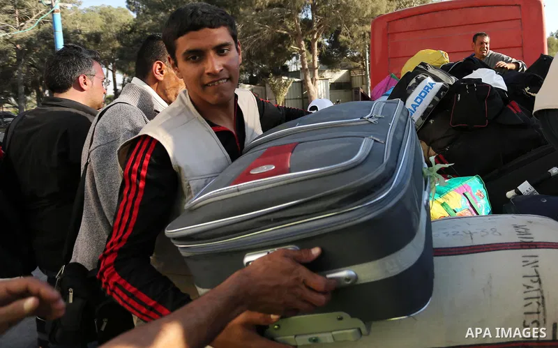 Palestinians arrival at Rafah crossing after it was opened by Egyptian authorities to allow stranded Palestinians to return to Gaza, in the southern Gaza Strip May 6, 2017. Photo by Ashraf Amra