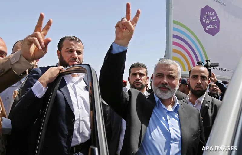 Newly elected Hamas chief, Ismail Haniya, flashes the V-sign after visiting protesters taking part in a sit-in in support of Palestinian hunger-striking prisoners held in Israeli jails, on May 8, 2017, in Gaza City. Phot...