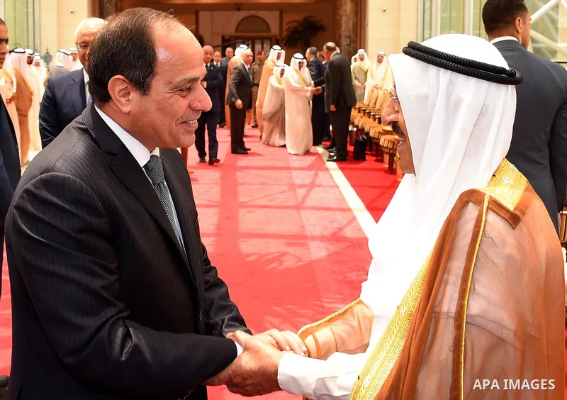Egyptian President Abdel Fattah al-Sisi shakes hands with Emir of Kuwait Sheikh Sabah al-Ahmad al-Jaber al-Sabah before leaving Kuwait on May 09, 2017. Photo by Egyptian President Office