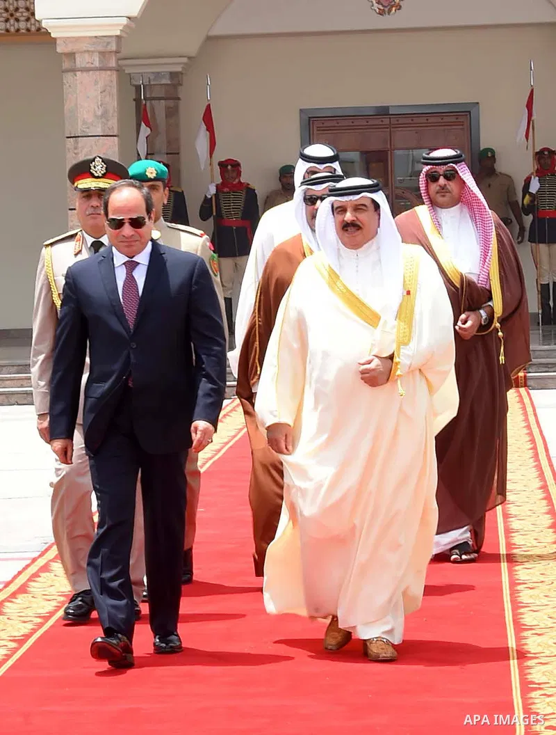Egyptian President Abdel Fattah al-Sisi walks alongside Bahrain's King Hamad bin Isa Al Khalifa before he leaves Bahrain on May 09, 2017. Photo by Egyptian President Office