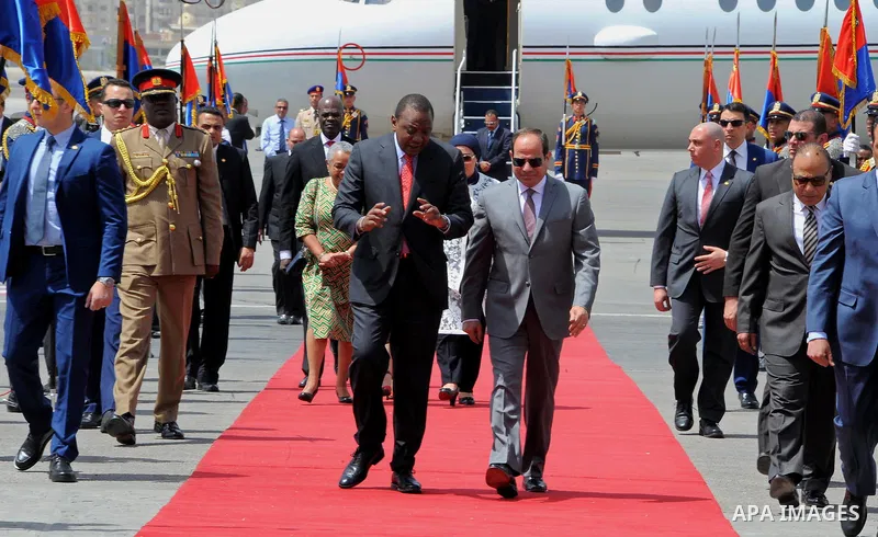 Egyptian President Abdel Fattah al-Sisi welcomes Kenyan President Uhuru Kenyatta upon his arrival at Cairo's international airport in Cairo, Egypt, on May 10, 2017. Photo by Egyptian President Office