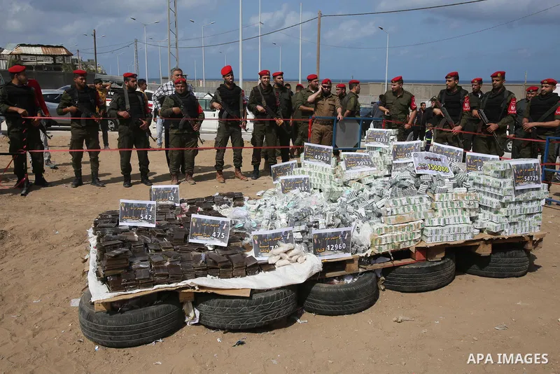 Members of Palestinian anti-drug police burn drugs that were seized by forces, in Gaza City May 11, 2017. Photo by Ashraf Amra