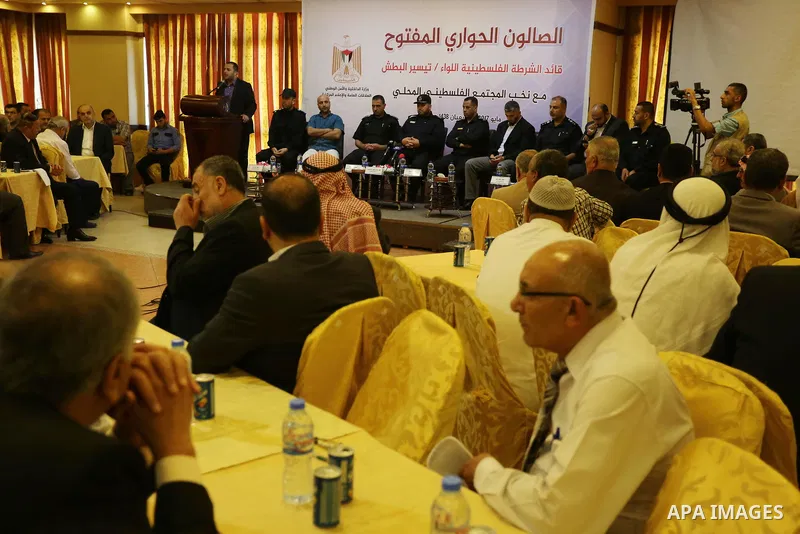 People attend a meeting for the Palestinian policemen, in Gaza City May 11, 2017. Photo by Ashraf Amra
