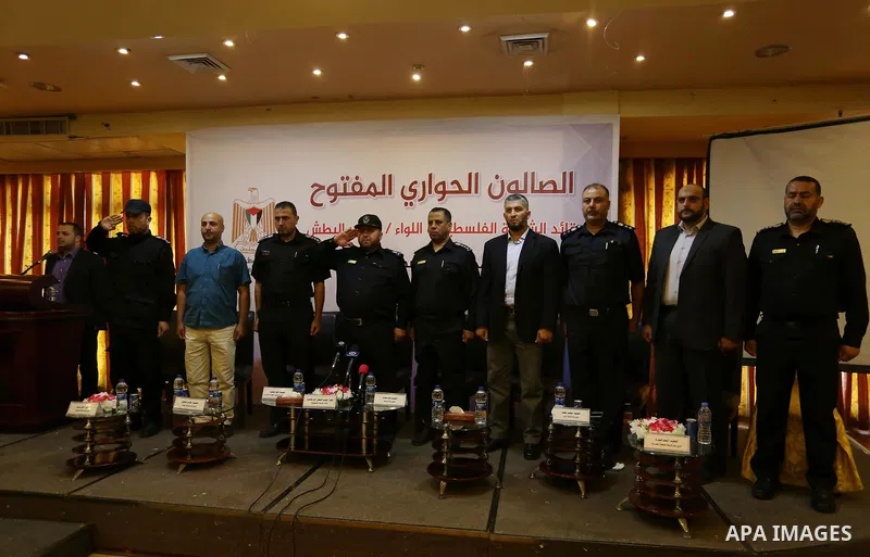 People attend a meeting for the Palestinian policemen, in Gaza City May 11, 2017. Photo by Ashraf Amra