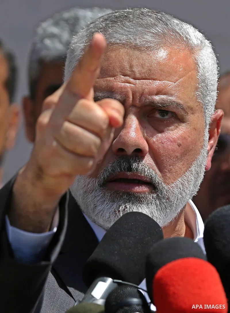 Ismail Haniyeh, leader of Hamas, gives delivers an address during a press conference in Gaza City on May 11, 2017, in which the group announced the arrest of the suspected murderer of one of its key military commanders,...