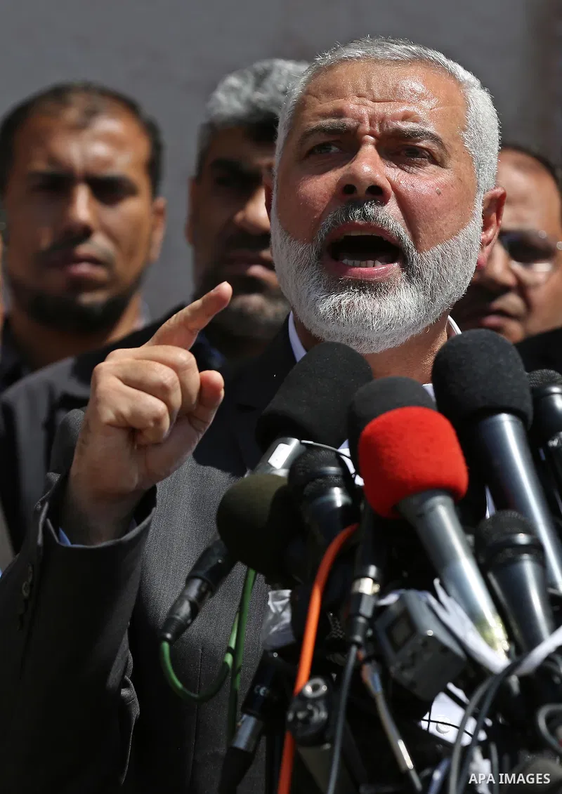 Ismail Haniyeh, leader of Hamas, gives delivers an address during a press conference in Gaza City on May 11, 2017, in which the group announced the arrest of the suspected murderer of one of its key military commanders,...