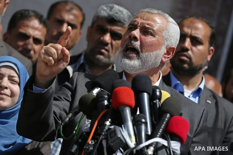 Ismail Haniyeh, leader of Hamas, gives delivers an address during a press conference in Gaza City on May 11, 2017, in which the group announced the arrest of the suspected murderer of one of its key military commanders,...