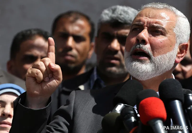 Ismail Haniyeh, leader of Hamas, gives delivers an address during a press conference in Gaza City on May 11, 2017, in which the group announced the arrest of the suspected murderer of one of its key military commanders,...