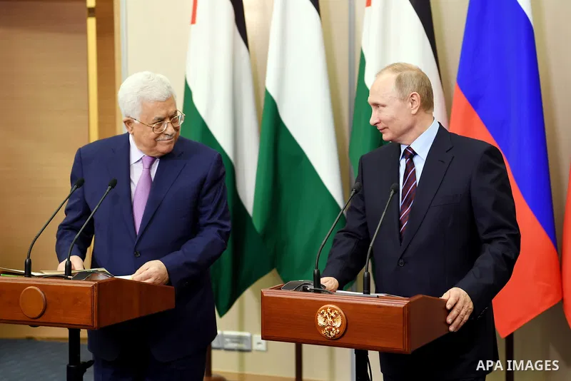 Russian President Vladimir Putin and Palestinian President Mahmoud Abbas attend a joint press conference following their meeting at the Bocharov Ruchei state residence in Sochi, Russia, May 11, 2017. Photo by Thaer Ganai...