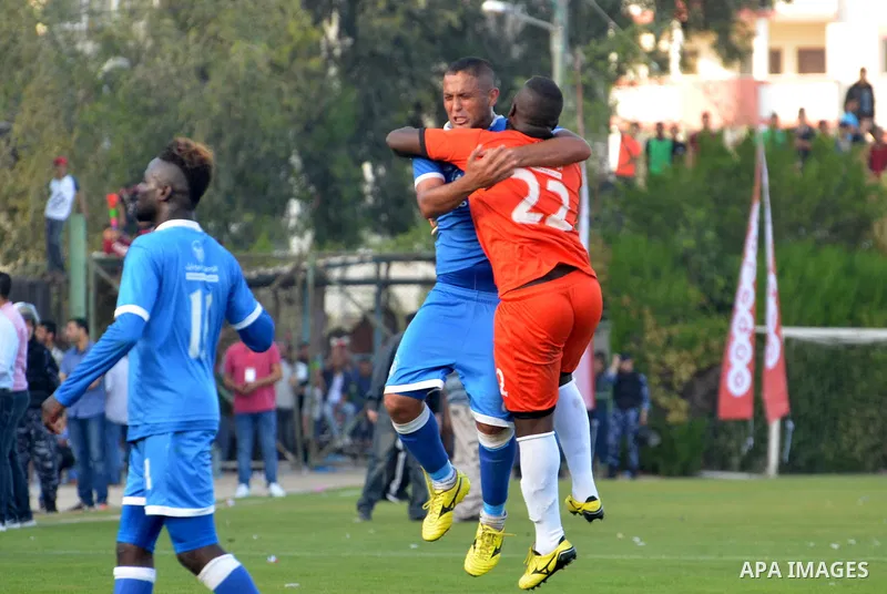 Palestinian Shabab Rafah football club players celebrateafter beating Khadamat Rafah football club during the final match of the Gaza Cup at Yarmouk stadium in Gaza City, on May 12, 2017. Photo by Mohammed El-Dalou
