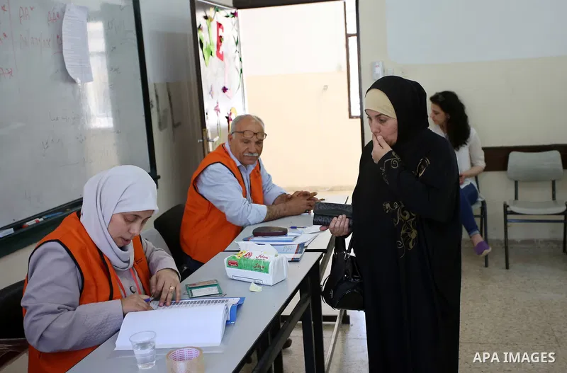 Palestinians arrive to cast their ballot during the municipal elections during the municipal elections in the West Bank of Nablus on May 13, 2017. Photo by Ayman Ameen