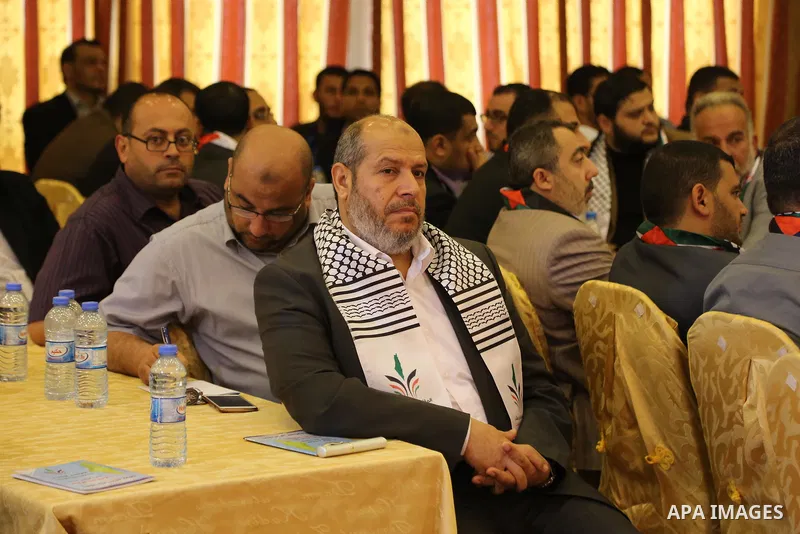 Palestinians attend a meeting organaized by Hamas and Islamic Jihad Movement, in Gaza city, on May 14, 2017. Photo by Ashraf Amra