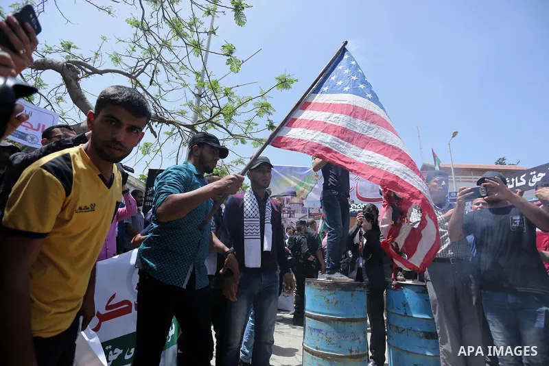 Palestinians burn American flag during a rally to commemorate the 69th anniversary of the "Nakba" in Gaza City, on May 15, 2017. "Nakba" means in Arabic "catastrophe" in reference to the birth of the state of Israel 69-y...