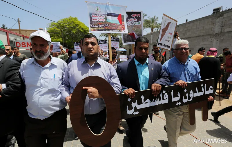 Palestinians take part in a rally to commemorate the 69th anniversary of the "Nakba" in Gaza City, on May 15, 2017. "Nakba" means in Arabic "catastrophe" in reference to the birth of the state of Israel 69-years-ago in B...