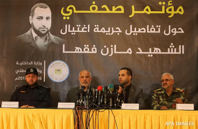 Ayad al-Bouzem, spokesman for the Palestinian Interior Ministry, speaks during a press conference to detect details of the killing one of its key military commanders, Mazen Faqha, who was shot dead on March 24, 2017 near...