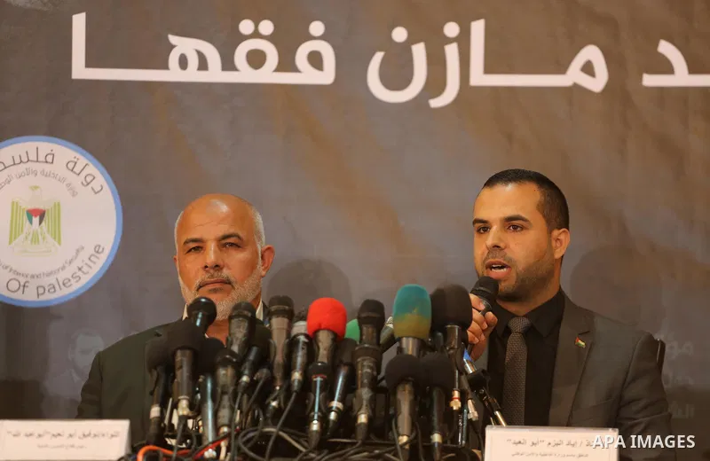 Ayad al-Bouzem, spokesman for the Palestinian Interior Ministry, speaks during a press conference to detect details of the killing one of its key military commanders, Mazen Faqha, who was shot dead on March 24, 2017 near...