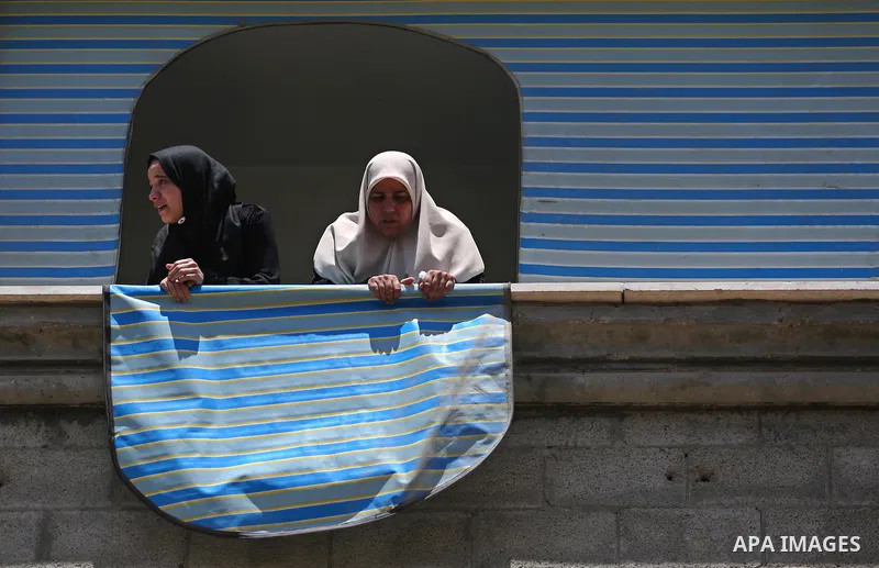Palestinian women mourn during the funeral of Mohammed Majed Bakr, a 25-year-old fisherman who died from his injuries after an Israeli patrol vessel fired at a fishing boat, in Gaza city on May 16, 2017. The Israeli patr...