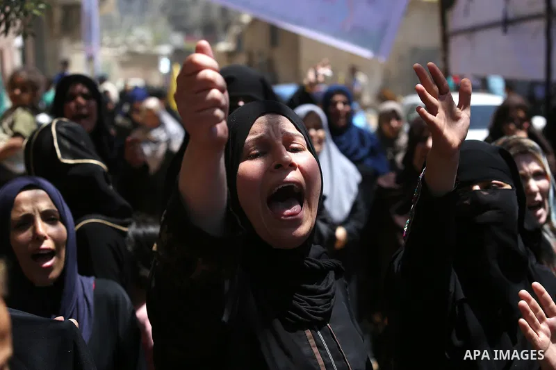 Palestinian women mourn during the funeral of Mohammed Majed Bakr, a 25-year-old fisherman who died from his injuries after an Israeli patrol vessel fired at a fishing boat, in Gaza city on May 16, 2017. The Israeli patr...