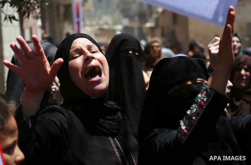 Palestinian women mourn during the funeral of Mohammed Majed Bakr, a 25-year-old fisherman who died from his injuries after an Israeli patrol vessel fired at a fishing boat, in Gaza city on May 16, 2017. The Israeli patr...