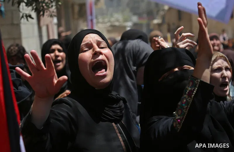 Palestinian women mourn during the funeral of Mohammed Majed Bakr, a 25-year-old fisherman who died from his injuries after an Israeli patrol vessel fired at a fishing boat, in Gaza city on May 16, 2017. The Israeli patr...