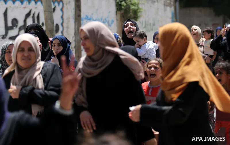 Palestinian women mourn during the funeral of Mohammed Majed Bakr, a 25-year-old fisherman who died from his injuries after an Israeli patrol vessel fired at a fishing boat, in Gaza city on May 16, 2017. The Israeli patr...
