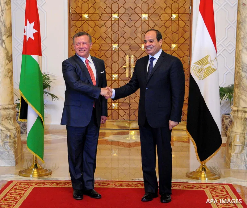 Egyptian President Abdel Fattah al-Sisi shakes hands with Jordan's King Abdullah II before a meeting in the Egyptian capital Cairo, on May 17, 2017. Photo by Egyptian President Office