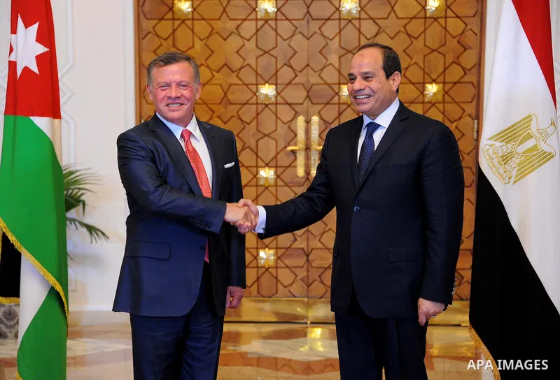 Egyptian President Abdel Fattah al-Sisi shakes hands with Jordan's King Abdullah II before a meeting in the Egyptian capital Cairo, on May 17, 2017. Photo by Egyptian President Office