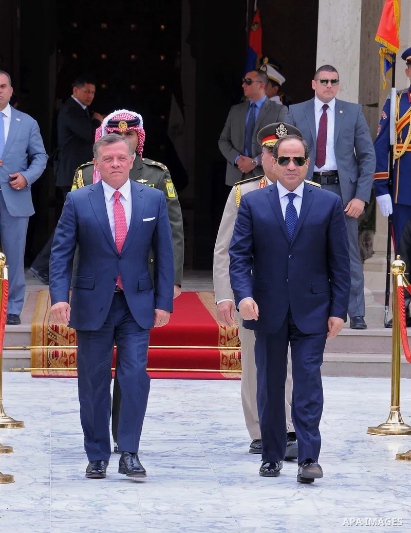 Egyptian President Abdel Fattah al-Sisi and Jordan's King Abdullah II review the honour guard during a welcome ceremony in the Egyptian capital Cairo, on May 17, 2017. Photo by Egyptian President Office