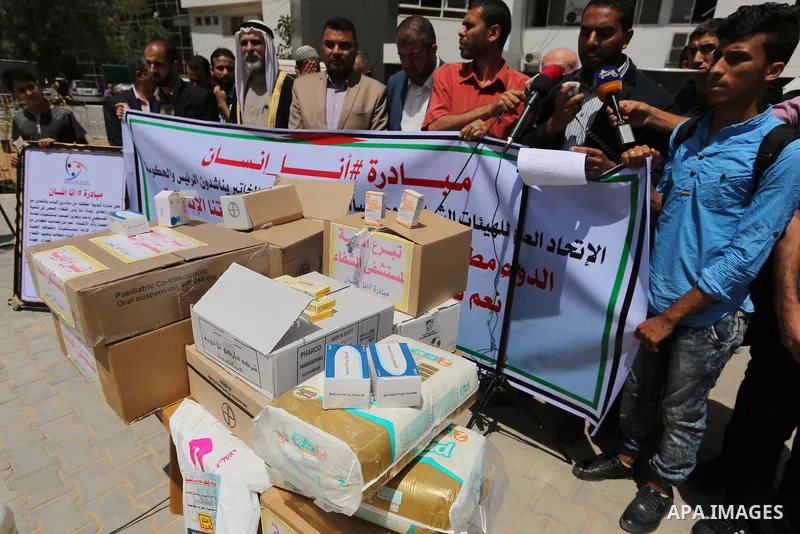 Palestinians take part a protest against Israeli blockade on Gaza strip, at Shifa hospital in Gaza city, on May 18, 2017. Photo by Ashraf Amra