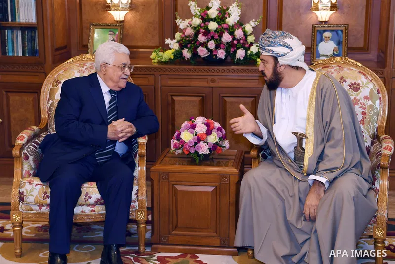 Palestinian President Mahmoud Abbas, meets with Deputy Prime Minister for Relations and International Cooperation of Oman, Asaad bin Tariq Al Said, in the Omani capital Muscat, on May 18, 2017. Photo by Thaer Ganaim