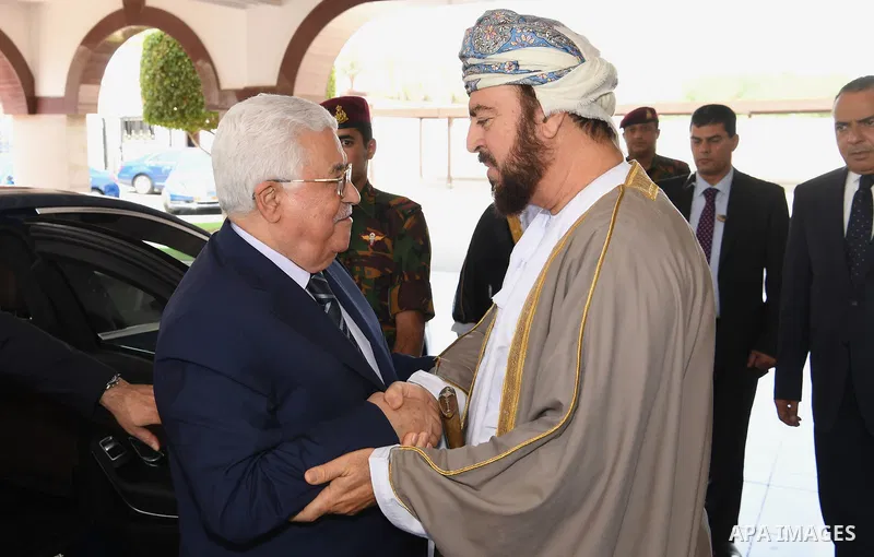 Palestinian President Mahmoud Abbas, meets with Deputy Prime Minister for Relations and International Cooperation of Oman, Asaad bin Tariq Al Said, in the Omani capital Muscat, on May 18, 2017. Photo by Thaer Ganaim