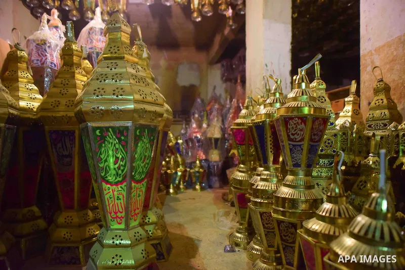 Lanterns known as "Fanous" in Arabic, are seen at a market ahead of the month of holy Ramadan in Cairo, Egypt, on May 21, 2017. Photo by Amr Sayed