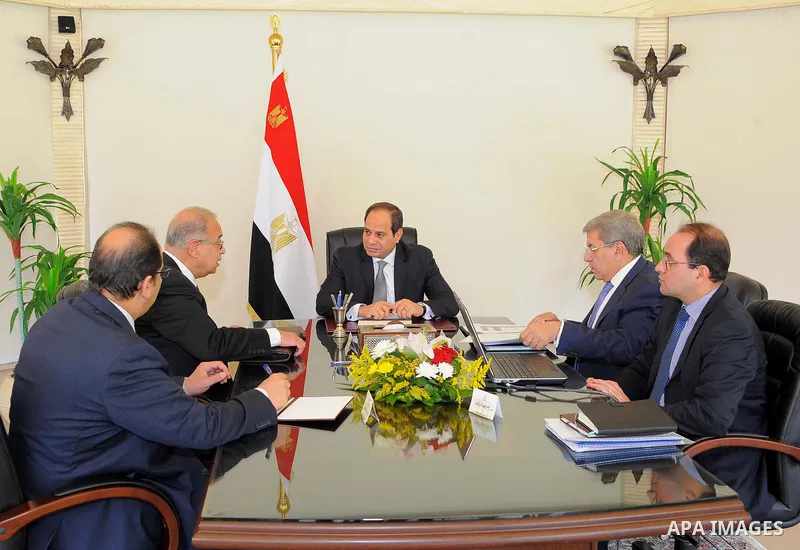 Egyptian President Abdel Fattah al-Sisi meets with Prime Minister Sharif Ismail, in Cairo, Egypt, on May 22, 2017. Photo by Egyptian President Office