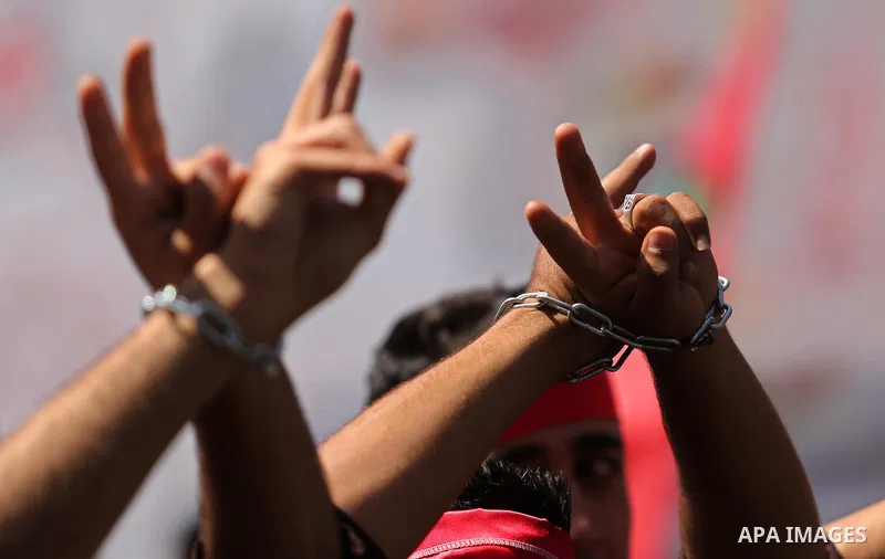Palestinian demonstrators take part in a protest in support of Palestinian prisoners held in Israeli jails and against the visit of U.S. President Donald Trump, in Gaza City May 23, 2017. Photo by Ashraf Amra