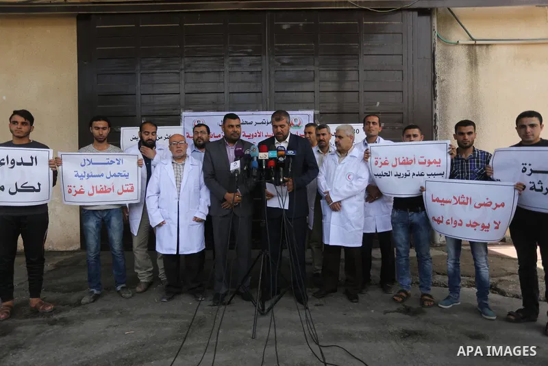 Director General of Pharmacy in the Ministry of Health, Mounir El Barsh, speaks to media during a protest against decision of Palestinian Authority halting shipments of baby formula and medicines to hospitals on Gaza str...