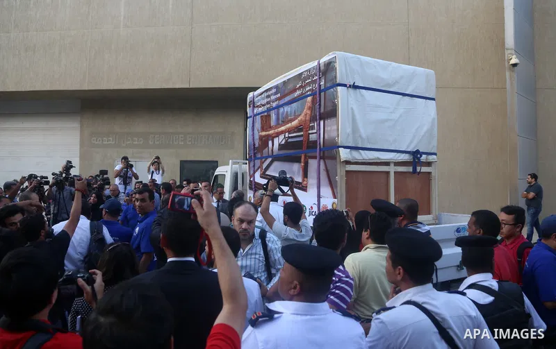 Egyptian workers open a box containing the funerary bed of ancient King Tutankhamun at the Grand Egyptian Museum (GEM) near the Pyramids Plateau in Giza, Egypt on May 23, 2017. The Egyptian Ministry of Antiquities moved...