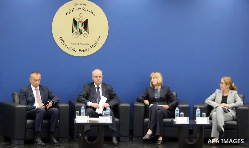 Palestinian Prime Minister Rami Hamdallah attends a meeting about donor countries in Palestine, at his office in the West Bank city of Ramallah, on May 24, 2017. Photo by Prime Minister Office