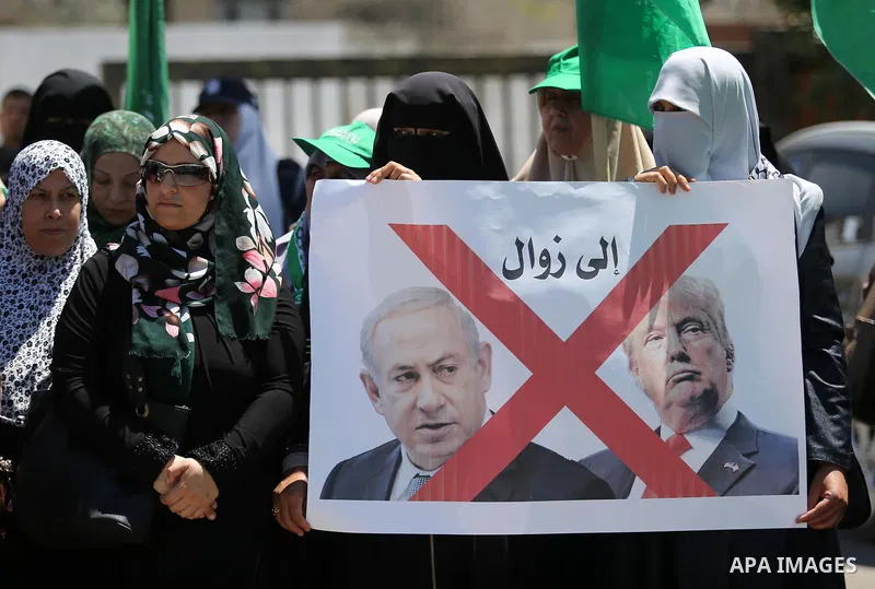 Palestinian women supporter Hamas movement take part during a protest against U.S. President Donald Trump comments linking Hamas with terrorism and support of prisoners refusing food in Israeli jails in Gaza city on May...