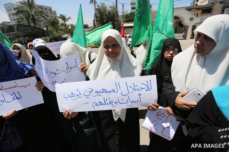 Palestinian women supporter Hamas movement take part during a protest against U.S. President Donald Trump comments linking Hamas with terrorism and support of prisoners refusing food in Israeli jails in Gaza city on May...