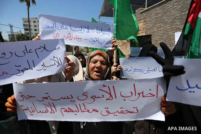 Palestinian women supporter Hamas movement take part during a protest against U.S. President Donald Trump comments linking Hamas with terrorism and support of prisoners refusing food in Israeli jails in Gaza city on May...
