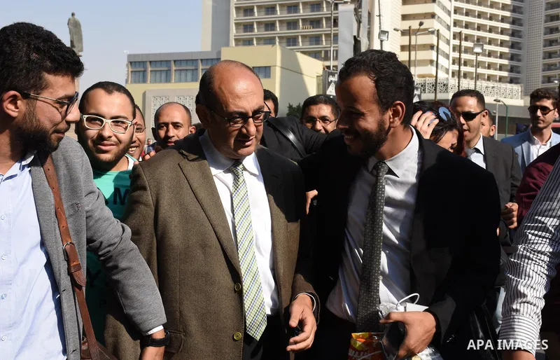 Former Egyptian presidential candidate and rights lawyer Khaled Ali, gestures upon his arrival in Cairo on May 24, 2017, after after he was released on bail. Ali, a former Egyptian presidential candidate and rights lawye...