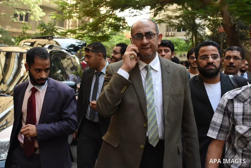 Former Egyptian presidential candidate and rights lawyer Khaled Ali, gestures upon his arrival in Cairo on May 24, 2017, after after he was released on bail. Ali, a former Egyptian presidential candidate and rights lawye...