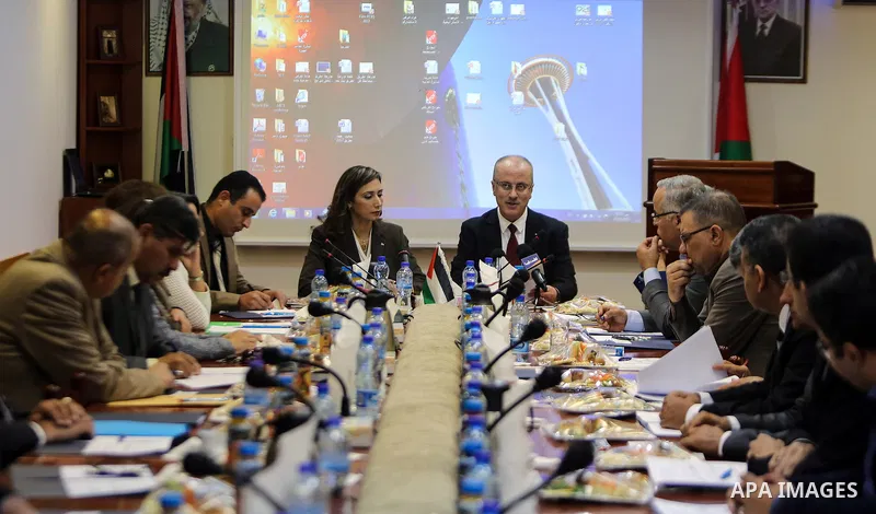 Palestinian Prime Minister, Rami Hamdallah, speaks during a meeting of the Advisory Council, in the West bank city of May 25, 2017. Photo by Prime Minister Office