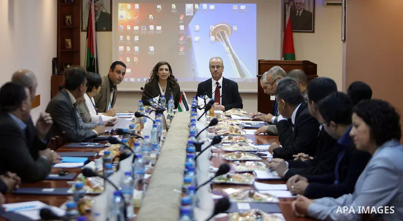 Palestinian Prime Minister, Rami Hamdallah, speaks during a meeting of the Advisory Council, in the West bank city of May 25, 2017. Photo by Prime Minister Office
