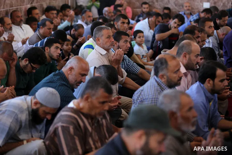 Palestinians attend the opening of the mosque of Mazen Faqha, in Zawayda in the central Gaza Strip on May 26, 2017. Photo by Ashraf Amra