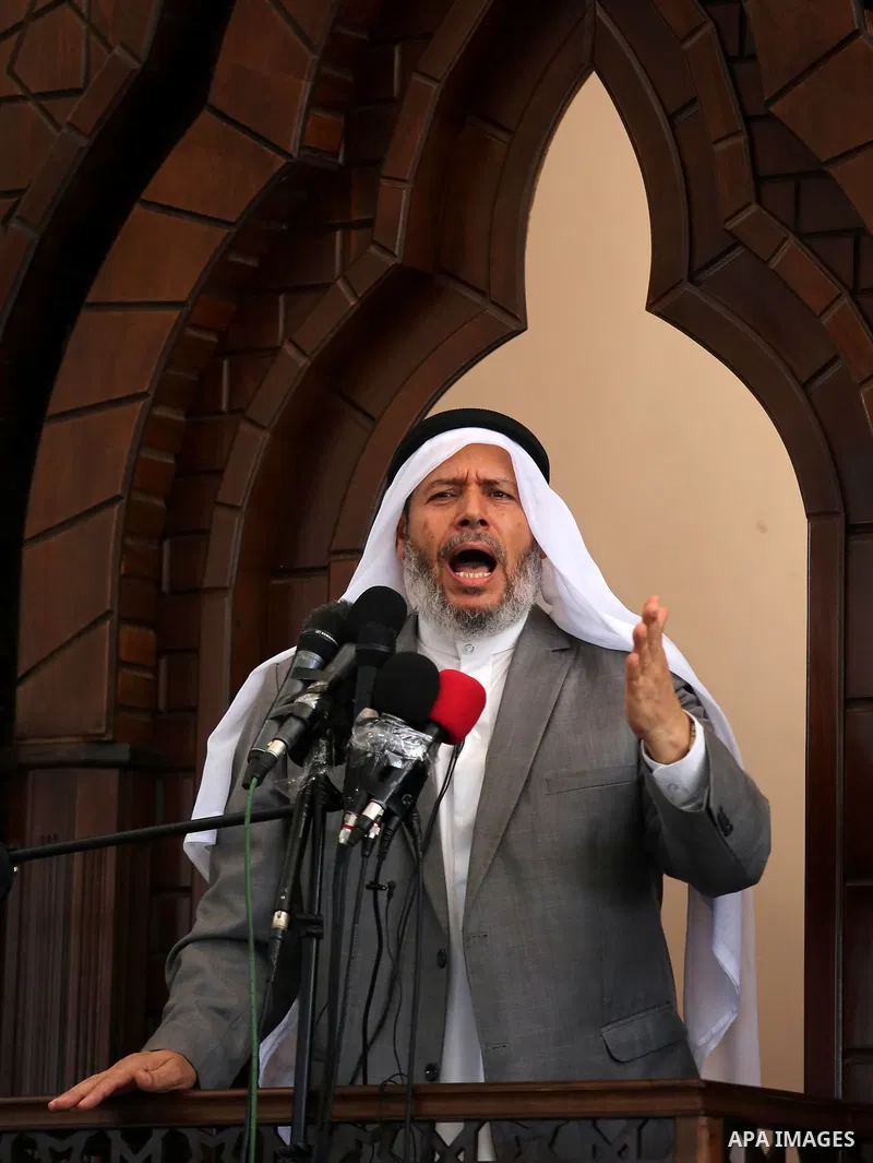 Senior Hamas leader Khalil al-Hayah speaks during the opening of the mosque of Mazen Faqha, in Zawayda in the central Gaza Strip on May 26, 2017. Photo by Ashraf Amra