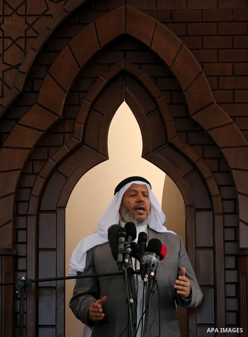 Senior Hamas leader Khalil al-Hayah speaks during the opening of the mosque of Mazen Faqha, in Zawayda in the central Gaza Strip on May 26, 2017. Photo by Ashraf Amra