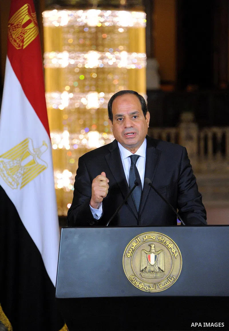 Egyptian President Abdel Fattah al-Sisi gives an address after the gunmen attack in Minya, accompanied by leaders of the Supreme Council of the Armed Forces and the Supreme Council for Police (unseen), at the Ittihadiya...