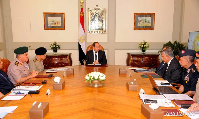Egyptian President Abdel Fattah al-Sisi meets with leaders of the Supreme Council of the Armed Forces and the Supreme Council for Police after the gunmen attack in Minya, at the Ittihadiya presidential palace in Cairo, E...