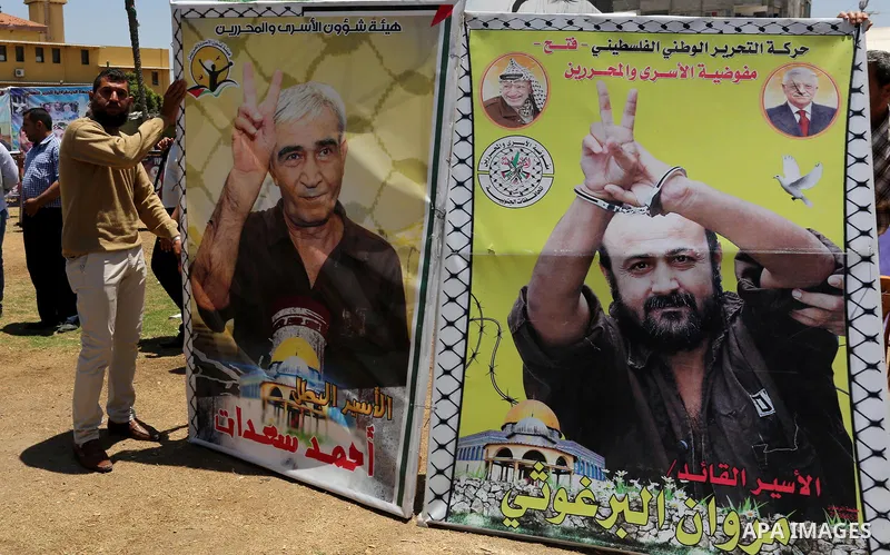 Palestinians celebrate after Palestinian prisoners in Israeli jails suspend hunger strike, in Gaza city on May 27, 2017. Hundreds of Palestinian prisoners on Saturday ended a 40-day hunger strike over conditions in Israe...
